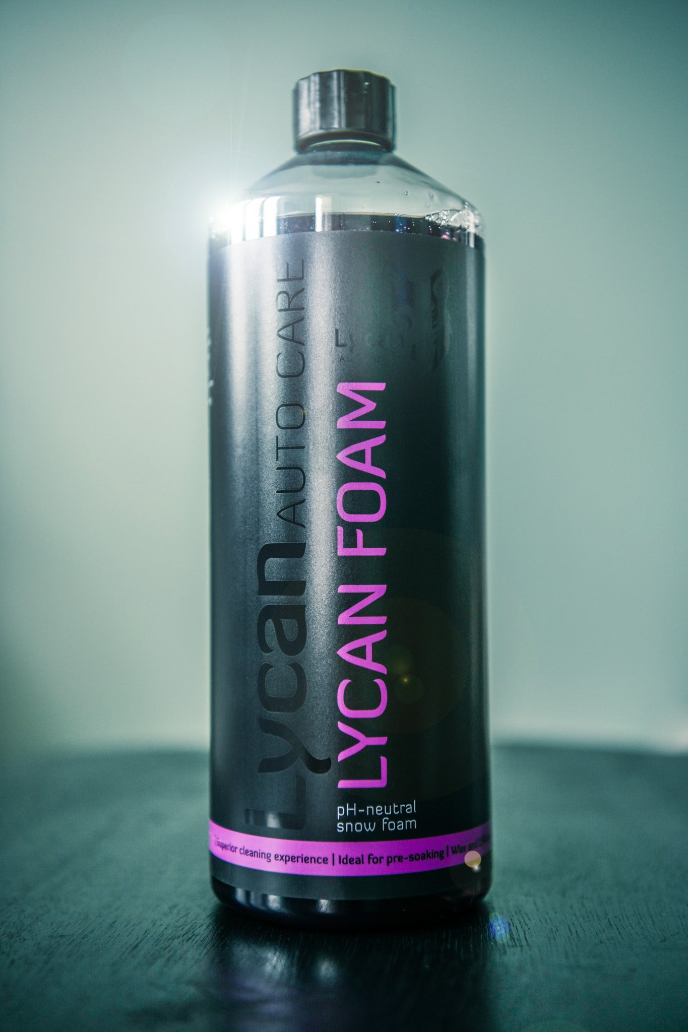 Lycan Auto Care snow foam in a sleek bottle for effective car cleaning and maintenance