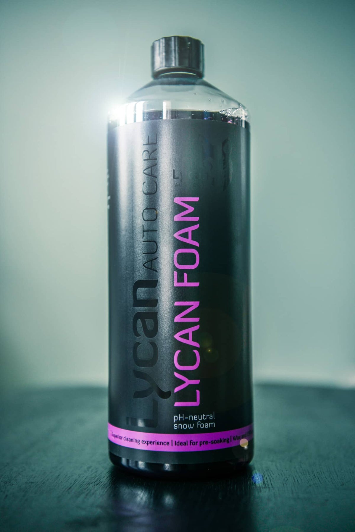 Lycan Auto Care snow foam in a sleek bottle for effective car cleaning and maintenance